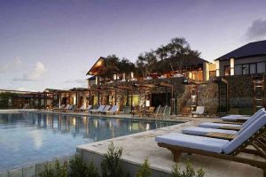 Bunker Bay - night time by the pool at Pullman Bunker Bay - luxury short breaks on private aircraft