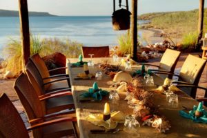 Faraway Bay - Eagle Lodge Dining overlooking the ocean - luxury private air tour