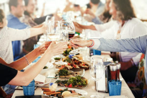 Christmas - People enjoying good food and wine.