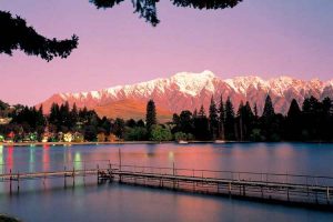 Queenstown - pink and purple sunset over the ski fields - Luxury solo tours