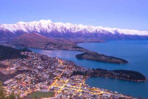 Queenstown - aerial view over the city at night - Luxury short breaks New Zealand